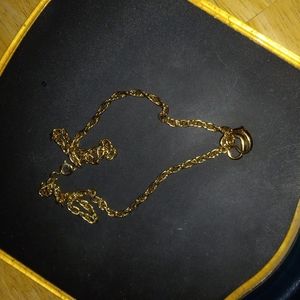 Goldtone necklace w/2 heart charms goldtone. Very pretty.